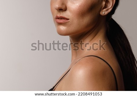 close-up girl with sweaty skin on her face and excessive oily sheen, excessive sweating, hyperhidrosis disease Royalty-Free Stock Photo #2208491053
