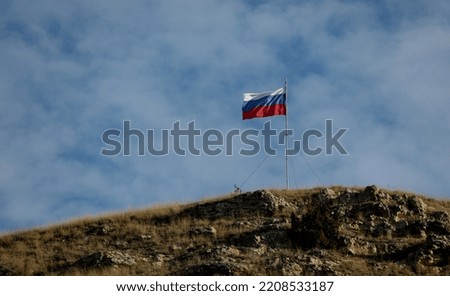City of Sevastopol (Crimea, Crimean peninsula) Flag of Russia on the top of the mountain