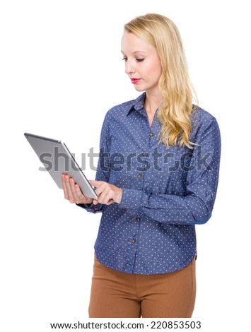 Caucasian woman look at tablet