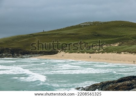 The beautiful, scenic landscape in Seilebost Beach, Isle of Harris, in a windy, cloudy summer day. Hebridean summer beach mood. Royalty-Free Stock Photo #2208561325