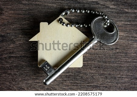 House keyring on key housing concept. High quality photo