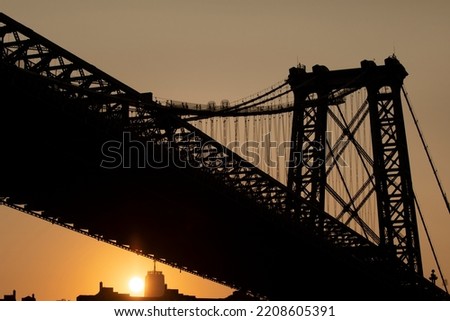 Williamsburg Bridge silhouette at sunset
