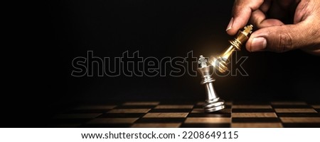 Hand choose king chess fight concept of challenge or team player or business team and leadership strategy or strategic planning and human resources organization risk management. Royalty-Free Stock Photo #2208649115