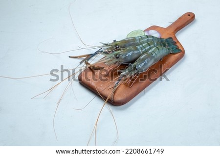 Raw fish isolated on white and banana leaf 