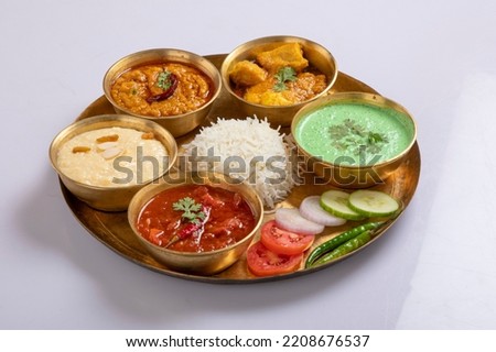 Indian Hindu Veg Thali  food platter, selective focus isolated on white background Royalty-Free Stock Photo #2208676537