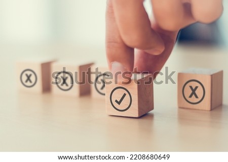 Regulatory compliance, project feasibility concept. Tick and cross signs. Checkmark and cross icons. Do and don't or like and unlike with positive and negative sign, approve and disapprove symbols.  Royalty-Free Stock Photo #2208680649