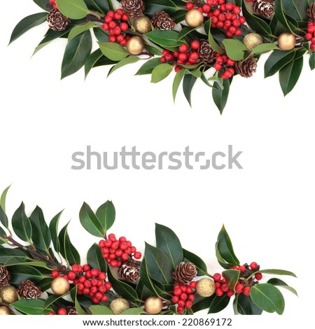 Christmas background border decoration with holly, baubles and pine cones over white background.