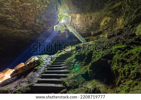 Stalbitsata cave meaning the stair, with a hole on the ceiling. Between heaven and hell concept. It is located near Lovech town in Bulgaria.