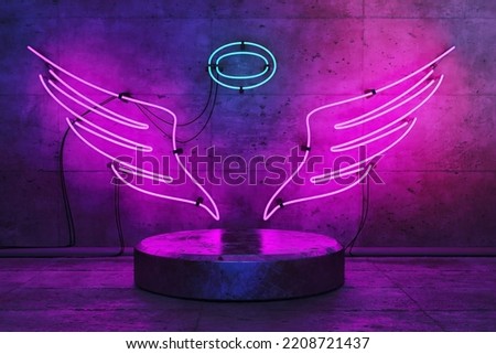 angel shaped neon lamp with base for product display. 3d rendering Royalty-Free Stock Photo #2208721437