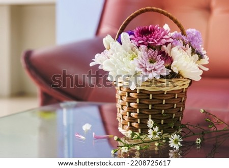 Chrysanthemum flower in the basket decorated living room