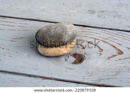 Zen stones on old wood