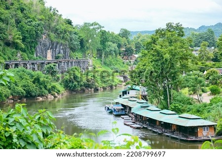 riverside community Passing the railway bridge, Kanchanaburi Province at 9.7.2022