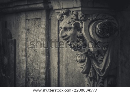 Close-up view of the statues and bas-relief statues in Zwinger Palace in Dresden. Saxony. Germany. Old photo effect.
