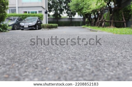 The paved road surface is smooth, calm, strong, stable.