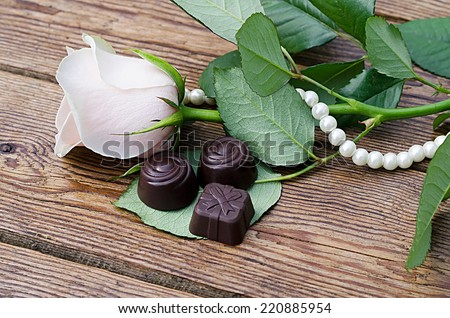 chocolates and rose with pearls