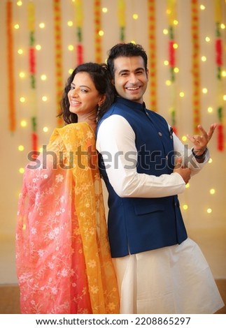 Couple celebrating diwali with full of happiness Royalty-Free Stock Photo #2208865297