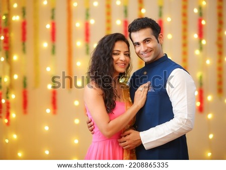 Couple celebrating diwali with full of happiness