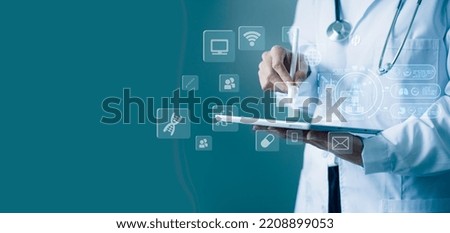 Medicine doctor using tablet with digital medical interface icons, Medical technology and network concept.