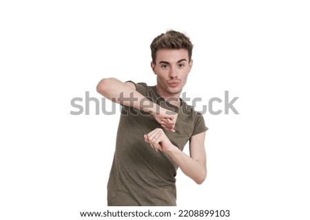 Young caucasian man dancing, isolated on white background.