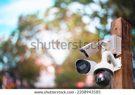 Multi-angle CCTV system on wooden poles, background blast cipping path 