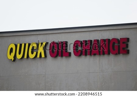 Quick Oil Change service business sign