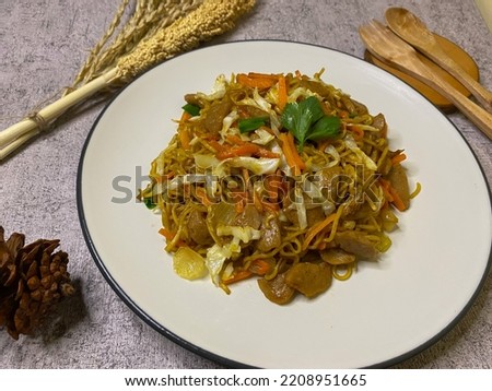 Close-up of Fried Noodles with a white plate