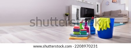 Cleaning House Products On Hardwood Floor At Home Royalty-Free Stock Photo #2208970231