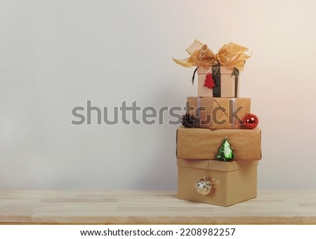 Christmas holiday present on wood table with copy space design.