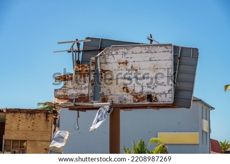 Billboards destroyed by heavy storm winds Fort Myers Hurricane Ian 2022 Royalty-Free Stock Photo #2208987269