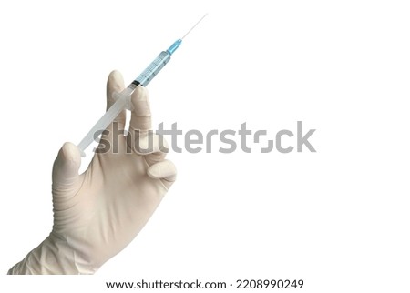 Close up doctor's hand in glove holding  syringe with needle isolated on white background with copy space for medical treatment, vaccination, filler injection, cosmetic surgical, laboratory concept. Royalty-Free Stock Photo #2208990249