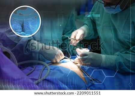Team of professional doctors performing operation in surgery room and illustration of different virtual icons