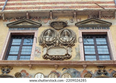 architectural sculptures on the exterior of an old house