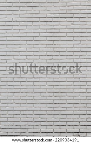 Background image vertical striped brick wall painted white, visible fine textures.