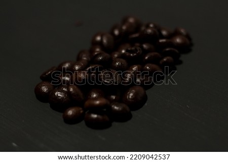 Photography of coffee beans on a dark background 