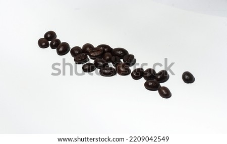 Photography of coffee beans on a dark background 