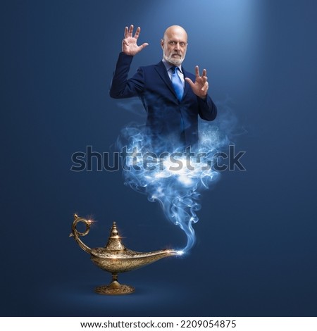 Corporate businessman genie coming out from a magic lamp, he is putting a spell on you Royalty-Free Stock Photo #2209054875