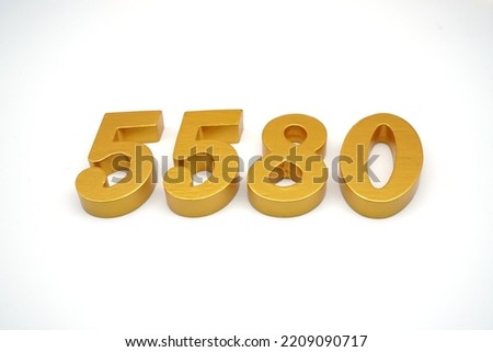 Number 5580 is made of gold-painted teak, 1 centimeter thick, placed on a white background to visualize it in 3D.                                