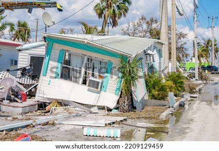 Mobile homes destroyed by Hurricane Ian Fort Myers FL Royalty-Free Stock Photo #2209129459