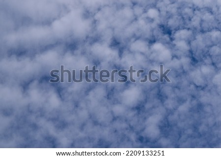 Background and texture of clouds over the Sea of Okhotsk (Pacific Ocean) over the Kuril Islands and Sakhalin