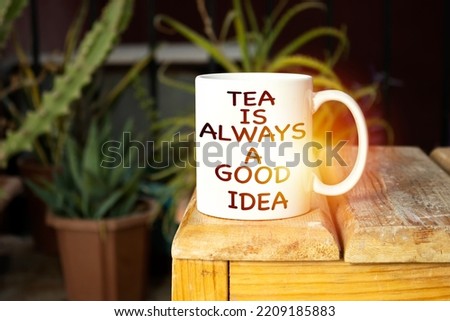 tea is always a good idea on cup above wooden table