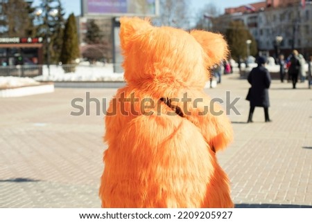 Figure of jumping animal. Orange fox. Growth doll.