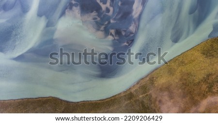 Aerial view from drone of glacial river in Iceland