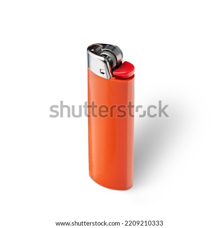Orange cigarette lighter, isolated on white Royalty-Free Stock Photo #2209210333