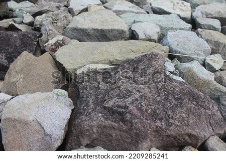 Close up photo of old dam wall stone, suitable for various purposes, such as geologic or business design materials.