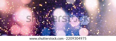 Holiday glowing backdrop. Defocused Background With Blinking Stars. Blurred Bokeh.