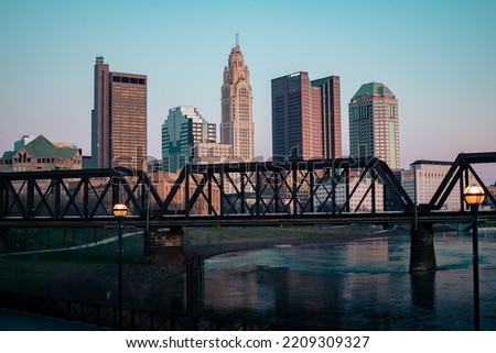 Columbus Ohio City Skyline with Train Bridge and Blue Sky