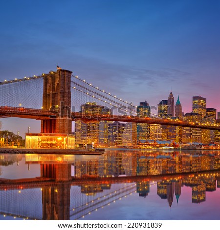 Brooklyn bridge and Manhattan at dusk, New York City