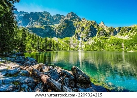 Tatra National Park in Poland. Famous mountains lake Morskie oko or sea eye lake In High Tatras. Five lakes valley Royalty-Free Stock Photo #2209324215
