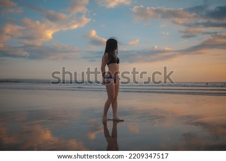 beautiful girl in bikini on the beach