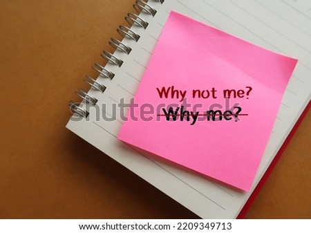 Pink note on notebook with handwritten text WHY ME? replaced with WHY NOT ME? - overcome negativity by create positive powerful affirmation to get your mind thinking in new directions Royalty-Free Stock Photo #2209349713
